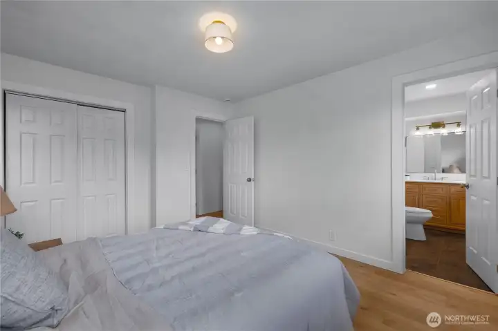 PRIMARY BEDROOM w/ ENSUITE