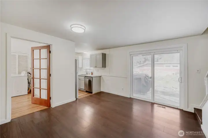 Bright and functional kitchen featuring sleek quartz counters and stainless steel appliances in this beautifully updated 4-bedroom home. Open-concept design flows seamlessly into the living and dining areas — perfect for everyday living and entertaining in Redmond’s sought-after Union Hill neighborhood.