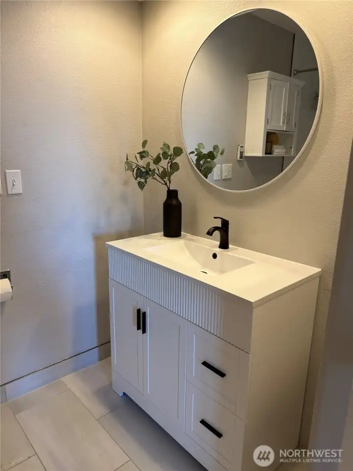Brand new vanity/sink/mirror/faucet——-Powder Bath (updated since Matterport was done)