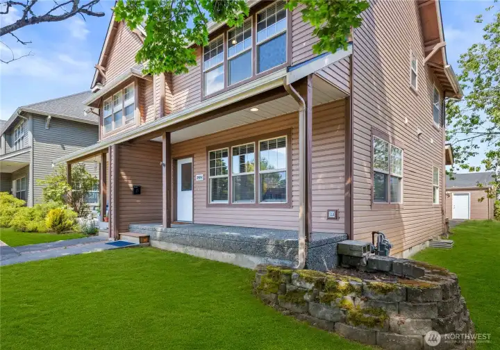 Classic architecture, generous windows, and mature landscaping create timeless curb appeal * grass has been enhanced *