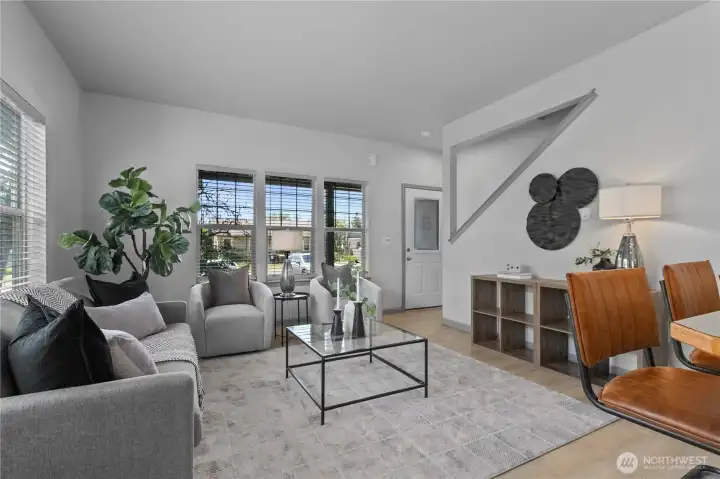 Open sightlines create an easy connection between the living spaces, ideal for gatherings both large and small.