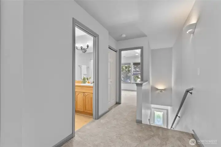 Thoughtful second-floor layout with easy access to the bedrooms, full bath, and conveniently located upstairs laundry.