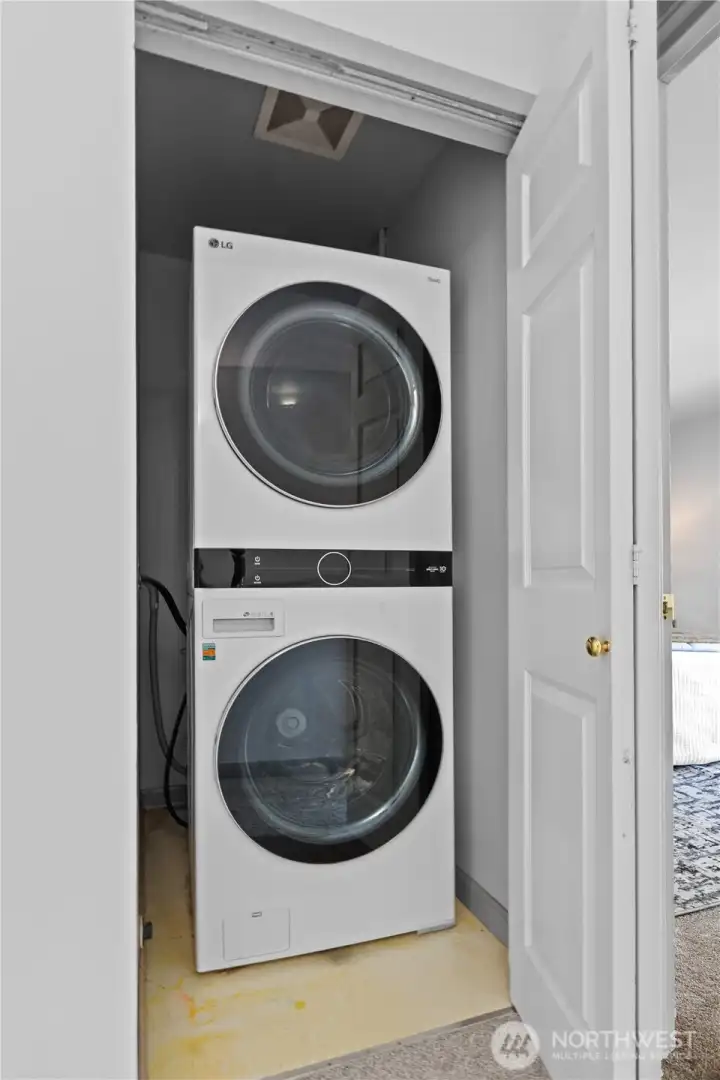 Laundry closet conveniently located on the same level as the bedrooms for everyday ease.