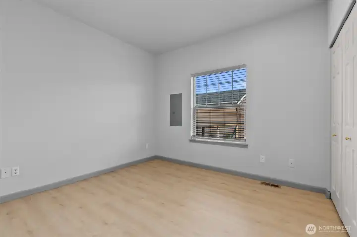A convenient main-level flex room offers excellent potential for a home office, guest space, playroom, or hobby room.