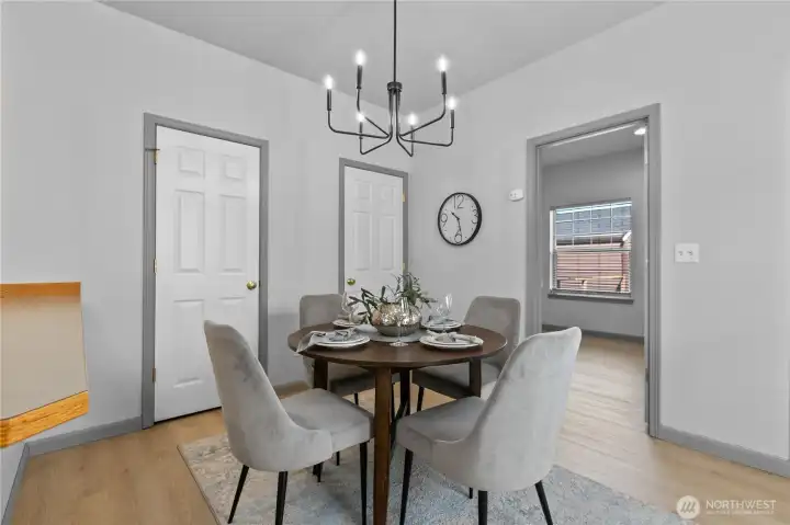 The dining area is perfectly positioned for everyday meals or hosting family and friends.