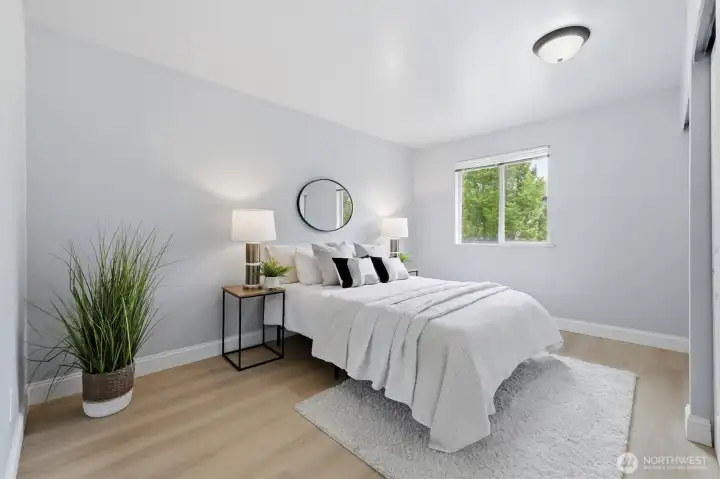 Primary bedroom w/ ensuite bath