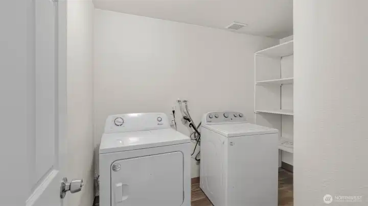 Large utility room with storage & appliances stay!