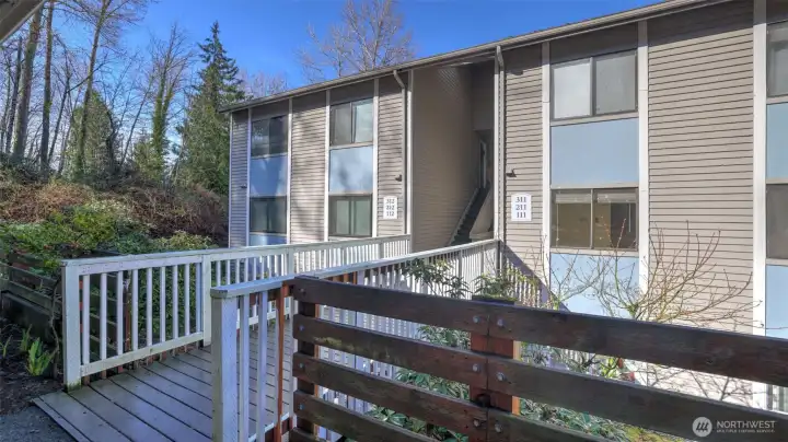 Unit R112 is a desirable end unit, conveniently located on the lower level for easy access.