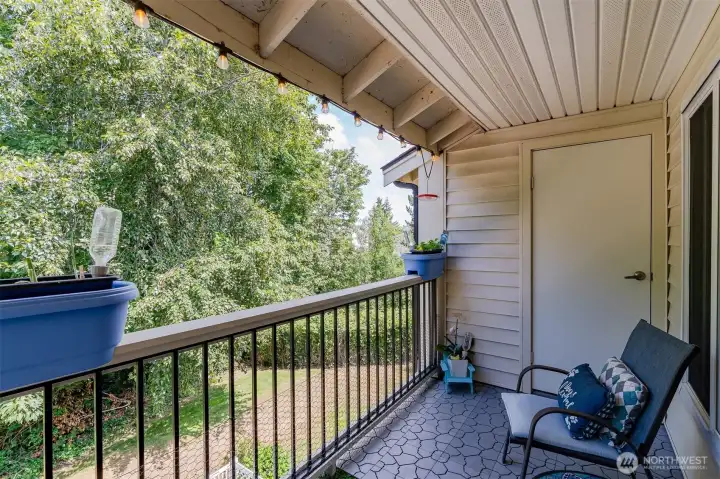 Private deck overlooking mature trees — enjoy your own outdoor retreat at this Bluegrass Condominiums home in Everett.