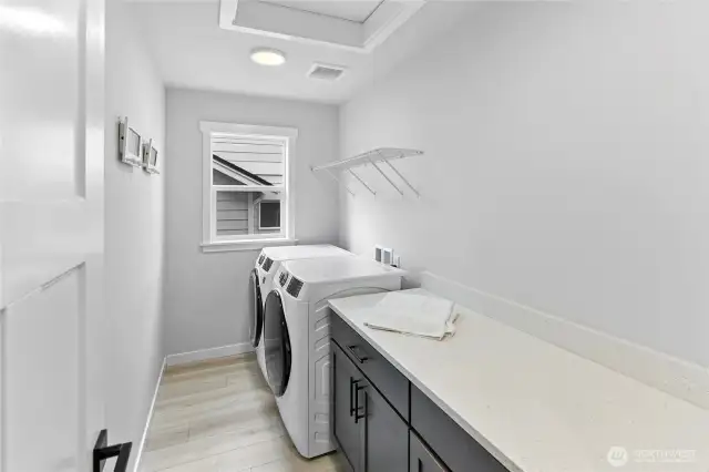 Upper level laundry with lots of room to work