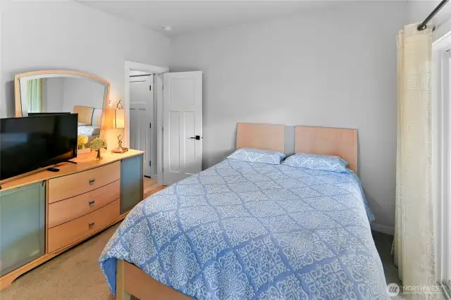 Lower level bedroom with ensuite bath