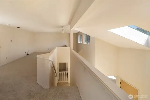 Upstairs to spacious loft area -