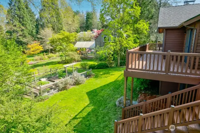 The 0.323 acre lot has two large grass areas and an established, organic garden.