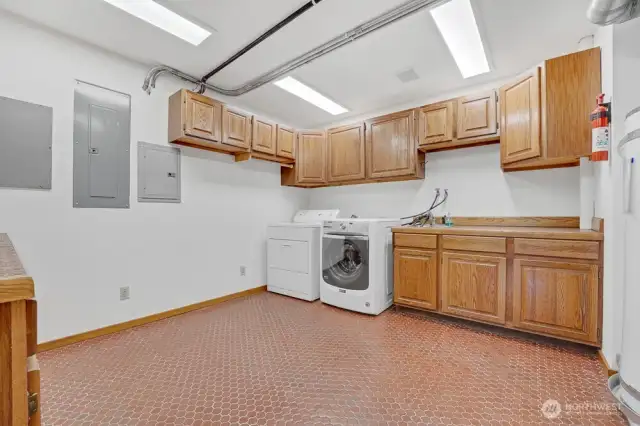 Utility and Laundry room on the lower level. The home is wired for a generator.