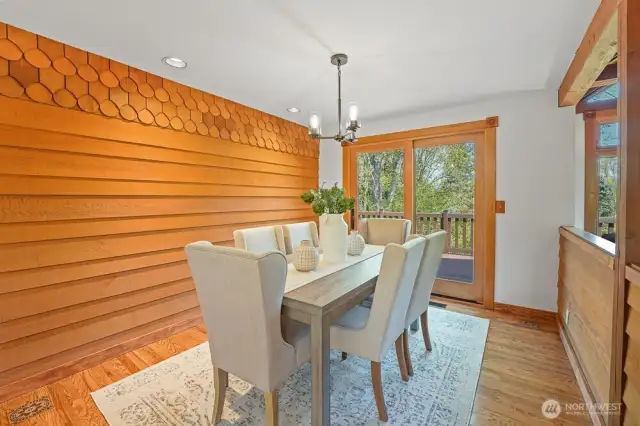 This home spares no details with the cedar accent wall in the dining room, updated solid wood french doors, and rich wood casing throughout.