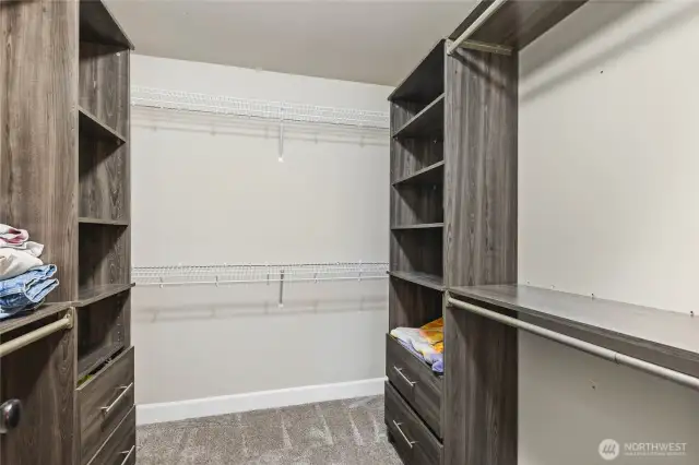 Large primary closet with nice built-ins