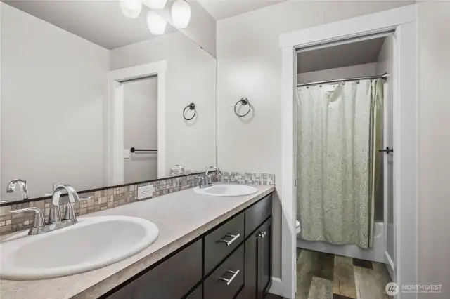 Guest Bathroom upstairs with separate water closet.