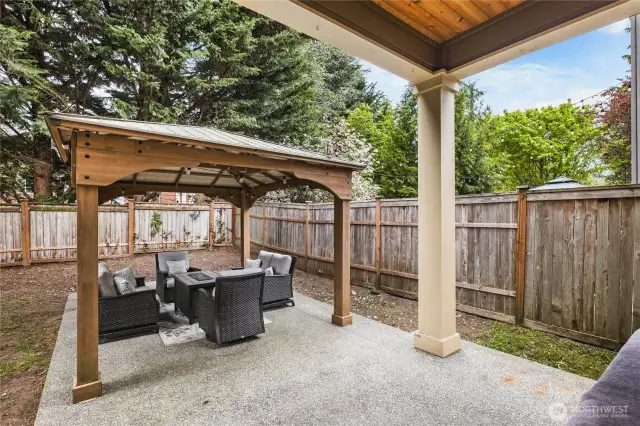 Step into the backyard to a sizable covered patio and an additional gazebo that stays!