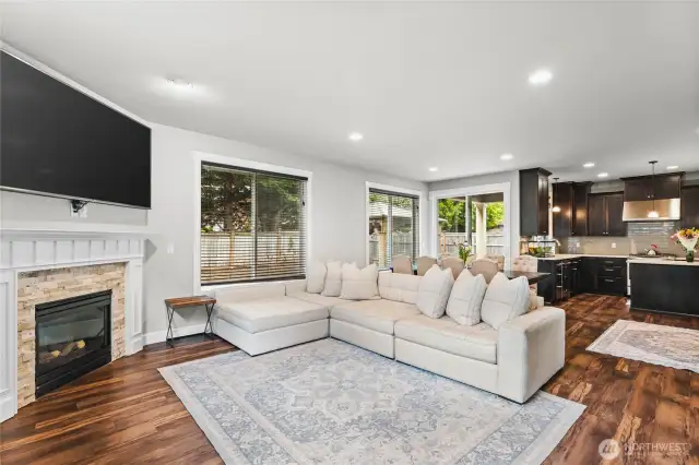 Bright and airy living space with high ceilings and seamless flow, perfect for entertaining.