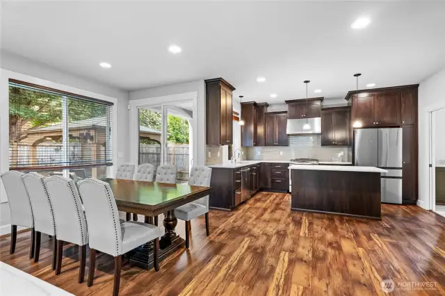 Dining room, kitchen and sliding doors to the back patio