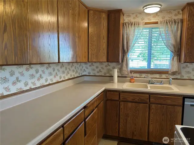 Kitchen.  Looks out to the back yard.