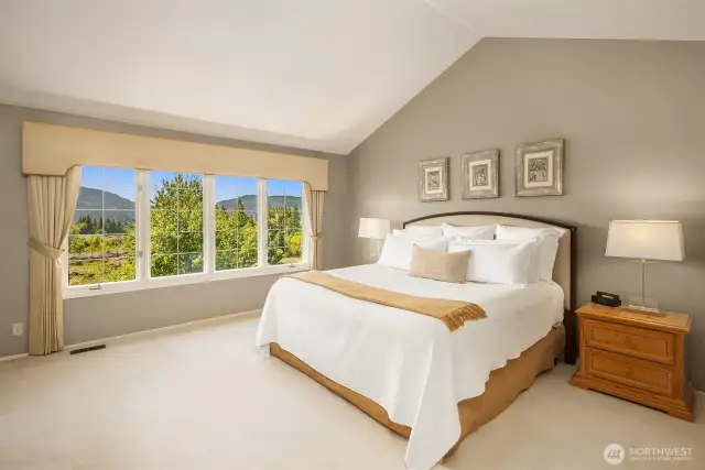 Tranquil main floor primary suite with views.