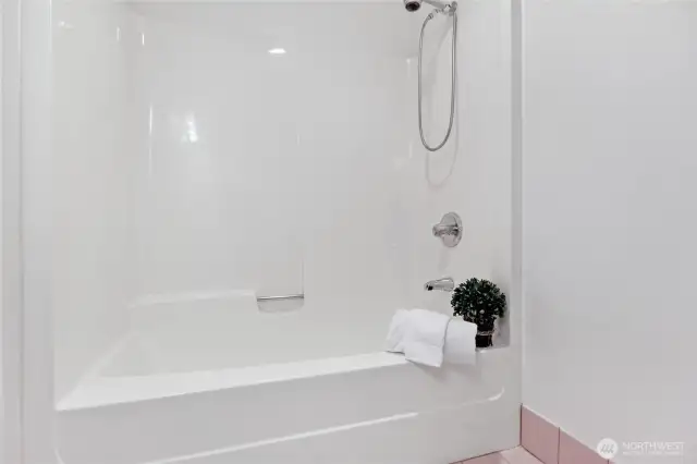 Enjoy the spacious upstairs bathroom, offering both convenience and a relaxing tub.