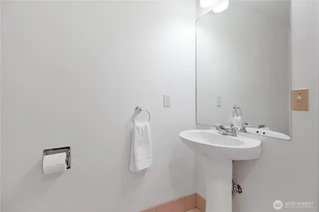The large upstairs bathroom is both convenient and well-appointed, featuring a tub for unwinding.