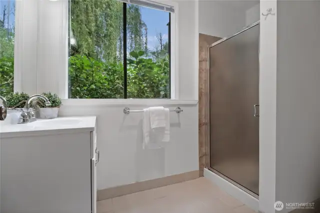 Convenient lower level 3/4 bath with shower and towel.