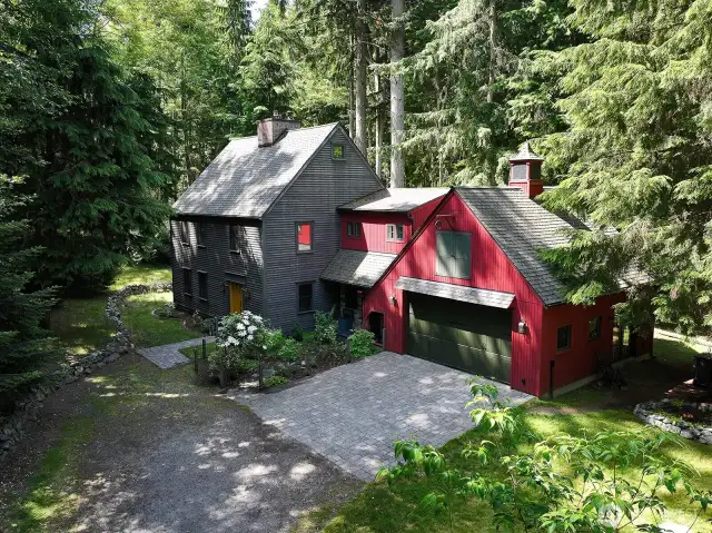 Custom designed and hand-built with restored Timber Frame. Structure framing is Premium Douglas Fir. Cedar siding is stained with color hues from the colonial period. Pella metal clad wood windows, double hung Architectural grade. All exterior & interior wood doors are custom made.