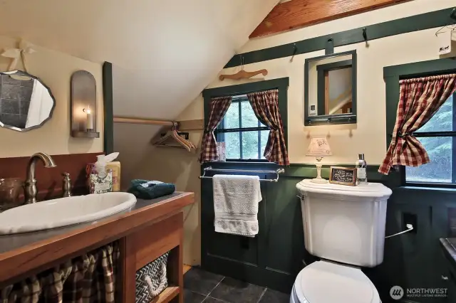 Full bath with tiled floor.