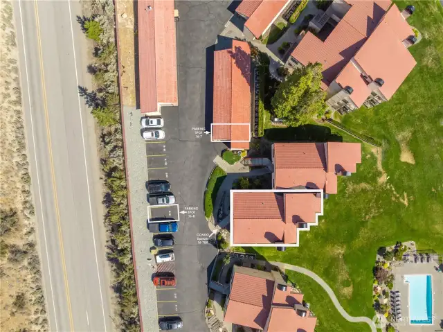 2 dedicated parking Spots one Carport and one open.