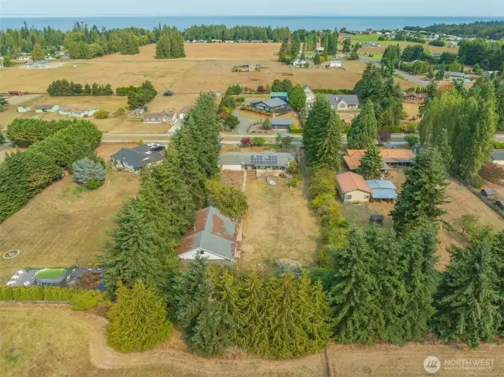 Home on 1 acre w/ exceptionally private backyard.