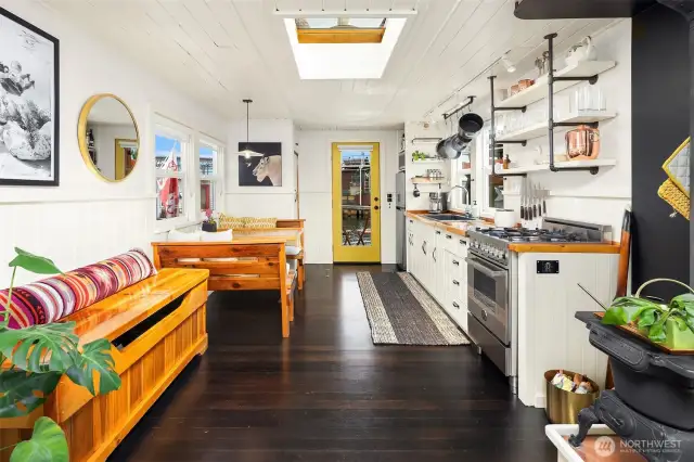 Refinished hardwoods in an open and airy floor plan with custom woodwork and thoughtful touches throughout.