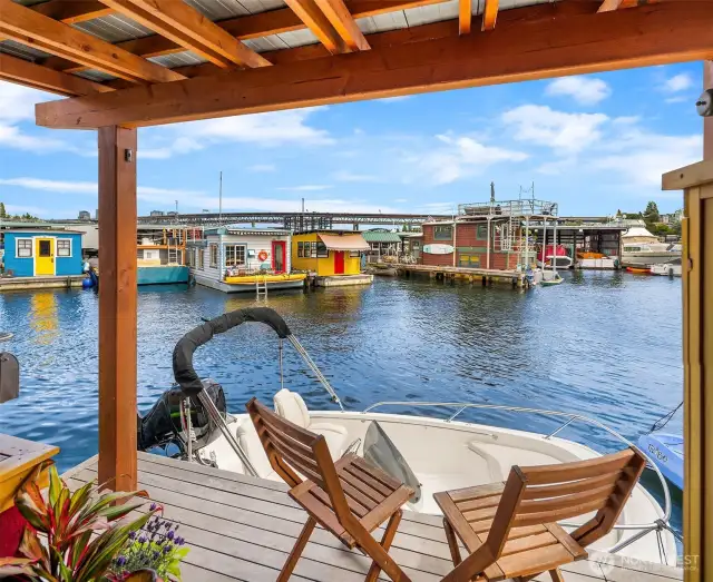 Lower back deck offers covered seating, storage and a BBQ area. And most of all - easy access to your kayak, paddle board, or Boston Whaler (also available for sale).