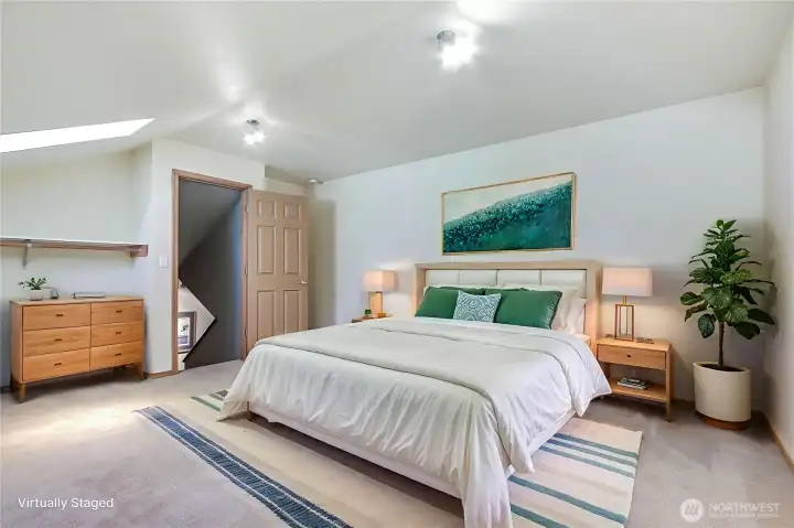 Upper bonus room view (we used it as a bedroom), your own staircase leading up, generous in size and 2 large skylights that open and are tinted. ***Virtually Staged***