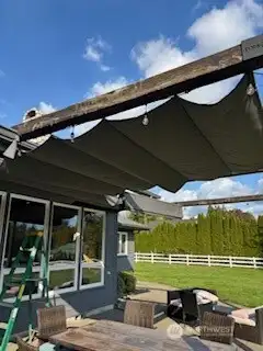 Pic showing one of the 2 patio sun shades out. Fully adjustable.