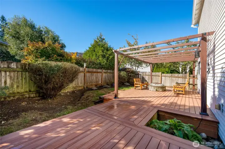 Sprawling entertainment deck perfect for summer BBQs and evening gatherings.
