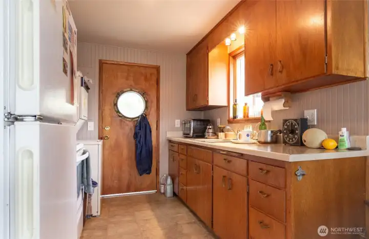 The kitchen is right in the entry way of the guest house.