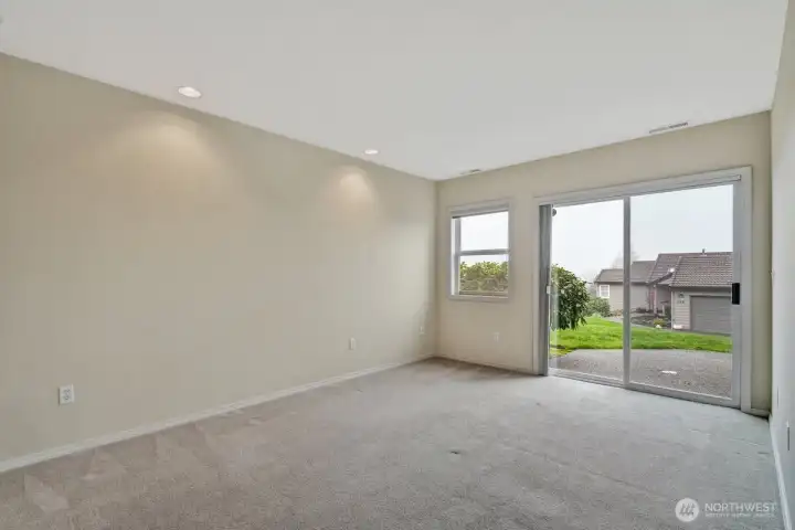 Primary Bdrm with Slider to Patio & View of Sound