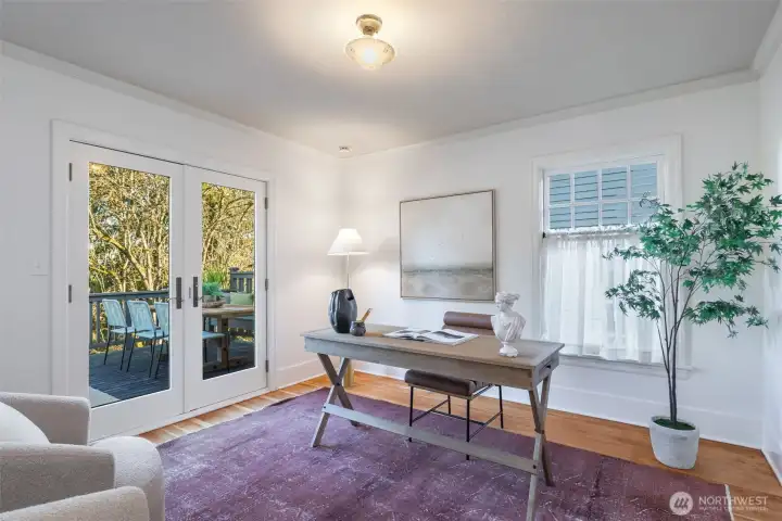 Main floor office opens to large deck - lovely Southeast exposure here.