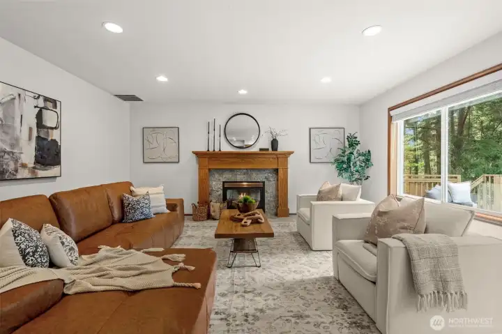 Kitchen opens to family room and cozy gas fireplace.