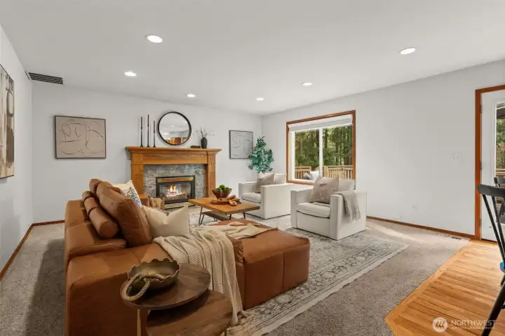 Kitchen opens to family room and cozy gas fireplace.