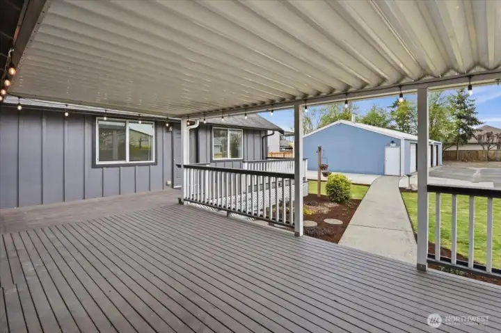 Great covered deck for all year entertaining & BBQing.