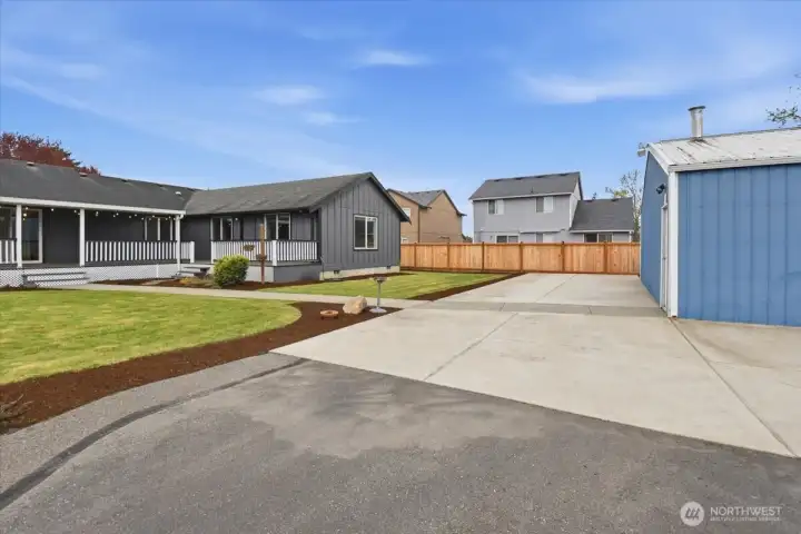 The concrete to the left of the shop was built to handle an oversized RV/Motorhome with a 6" concrete