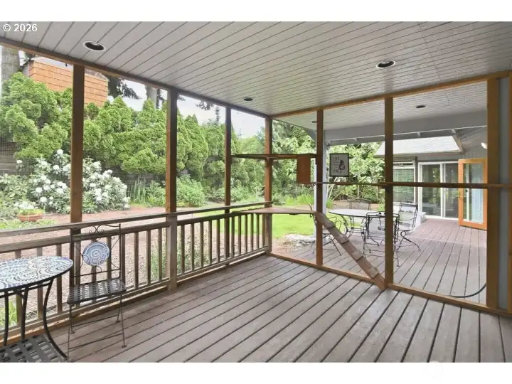 Catio. Outdoor screened room with a  door to backyard..