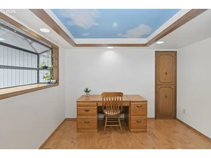 Office with garden window.