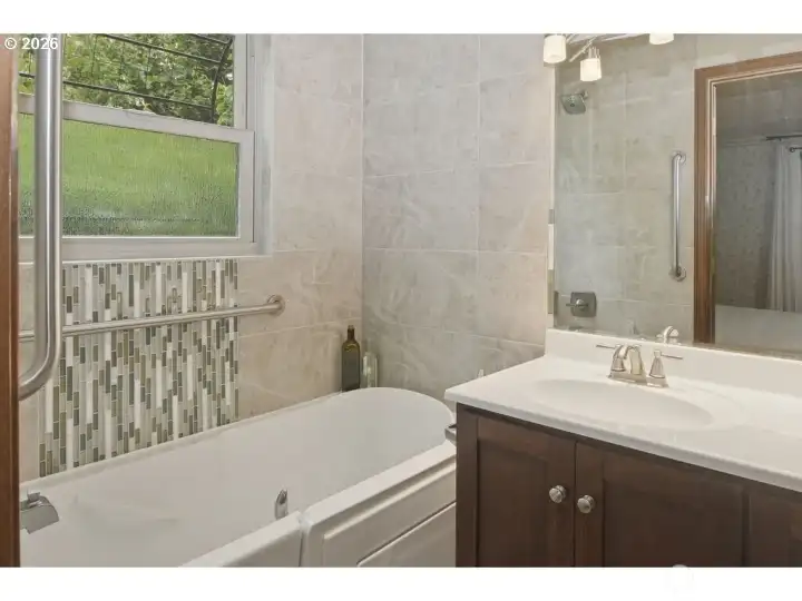Bathroom attached to primary bedroom.