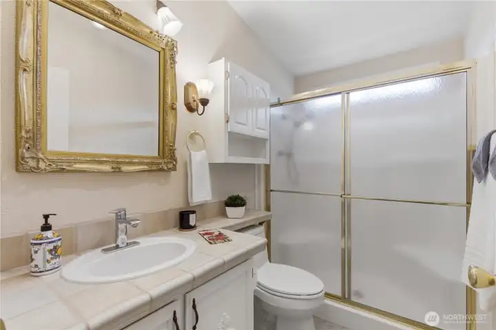 Main Bath with transom window which brings in natural light