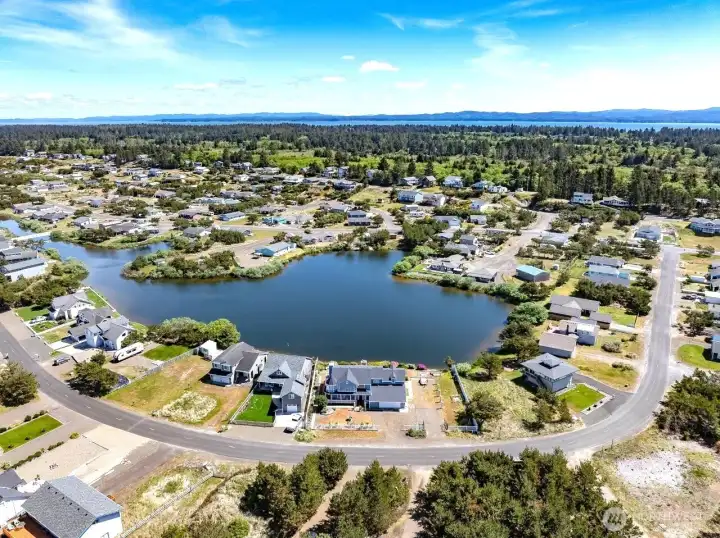 Sitting on two large lots, the home is not far from Willapa Bay in the background and Seabreeze Lake in this home's backyard.